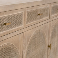 Cane sideboard with brass pulls.
