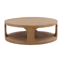 Round wooden coffee table with a lower shelf on a white background