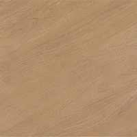 Close-up of a brown wooden surface with visible grain.