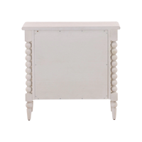 White wooden side table with decorative legs on a white background