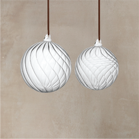 Clear ornaments with swirls.